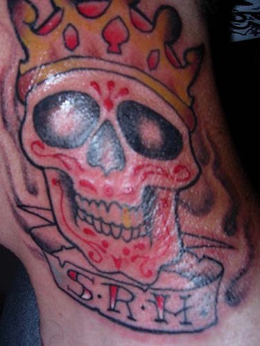 Crowned skull with initials tattoo