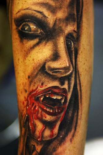 Lady vampire face tattoo