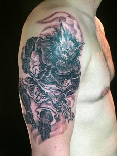 Asian style death demon tattoo