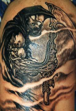 Biomech grim reaper tattoo