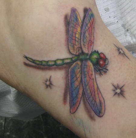 Realistic detailed dragonfly tattoo