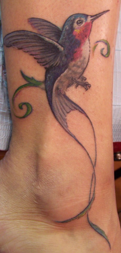 Detailed hummingbird tattoo on ankle
