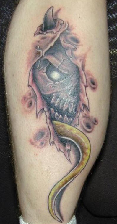 Devil and snake under skin rip tattoo