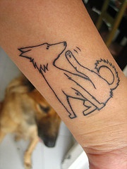 Minimalistic white dog tattoo