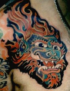 Chinese human dragon coloured tattoo