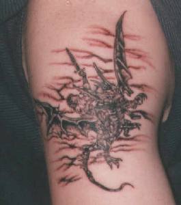 Dragon rider in sky tattoo