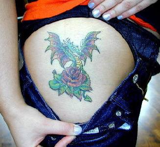 Blue dragon and rose tattoo