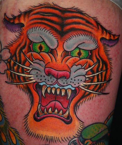 Classic style roaring tiger tattoo