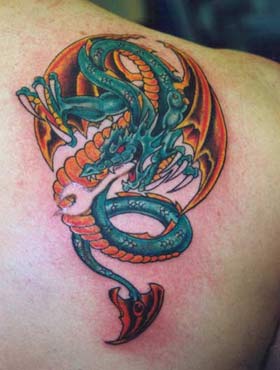 Flying blue fire dragon tattoo