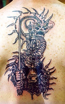 Dragon with gnome warrior tattoo