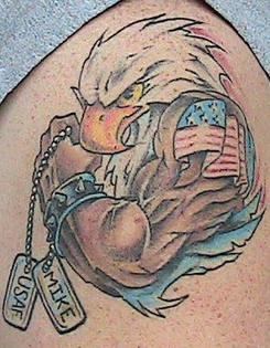 Humanized eagle with dog tags tattoo