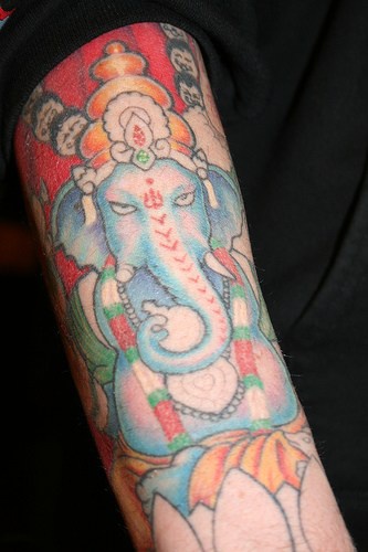 East indian ganesha coloured tattoo