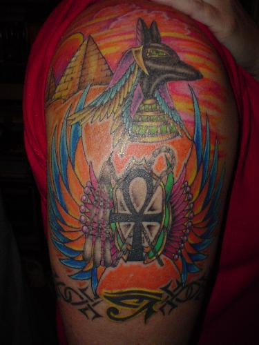 Egyptian anubis deity and ankh colourful tattoo