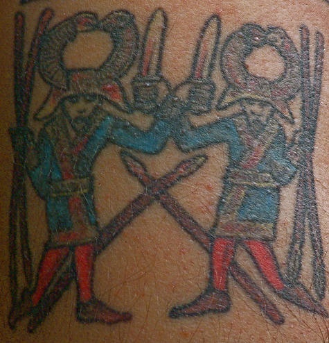Egyptian style tattoo with two warriors