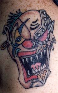 Evil robotic clown tattoo