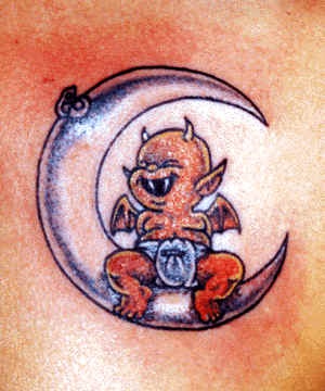 Little demon on moon tattoo