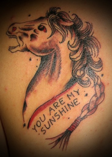 You are my sunshine evil horse tattoo