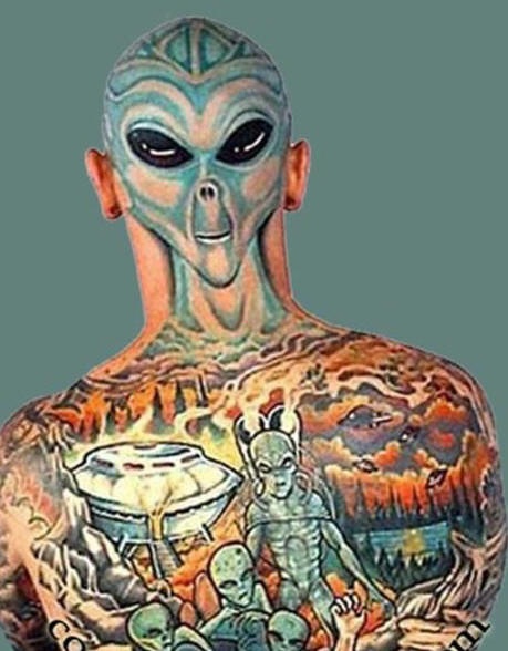 Original alien face tattoo on back