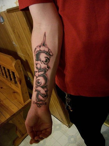 Eyeballs kebab arm tattoo