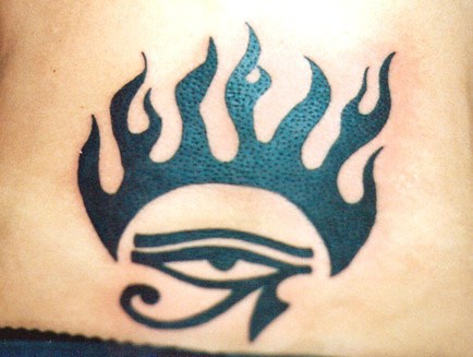 Eye of horus in flame tattoo