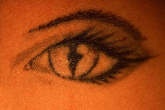 Cat woman eye tattoo