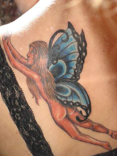 Naked fairy with butterfly wings tattoo