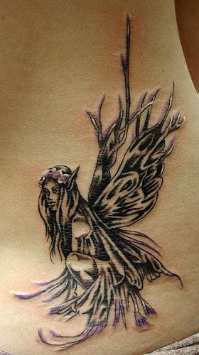 Black and white forest fairy tattoo