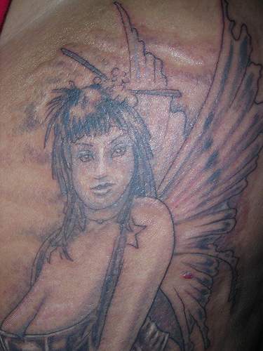 Fairy amazonian black ink tattoo