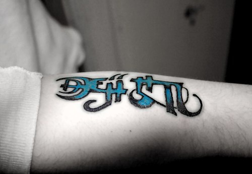 Glaube Hoffnung Ambigram Tattoo
