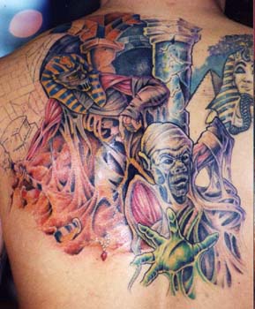 Anubis slaying mummy coloured tattoo