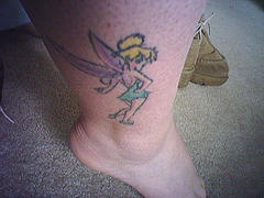 Tinkerbell leg tattoo