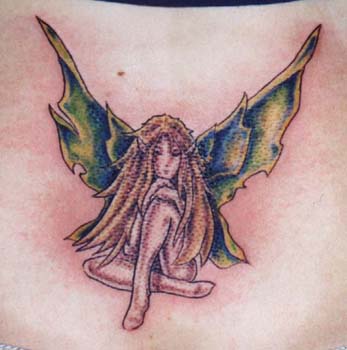 Sad blonde fairy tattoo