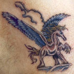 Fantasy unicorn coloured tattoo