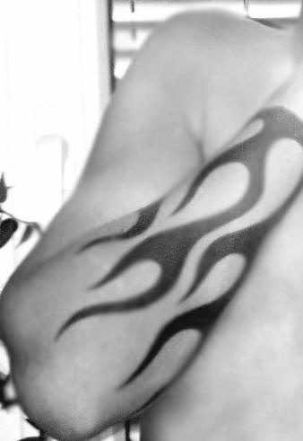 Black flames sleeve tattoo