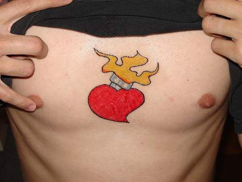 Set heart on fire tattoo