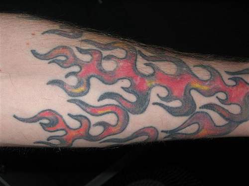 Regular flames arm tattoo