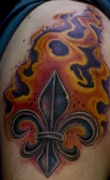 Fleur de Lis Symbol in Flamme Tattoo