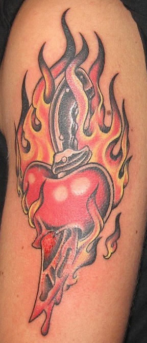 Flaming dagger stabbed heart tattoo