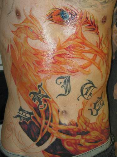 Flaming phoenix full chest  tattoo