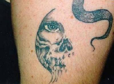 Skull with human eye tattoo