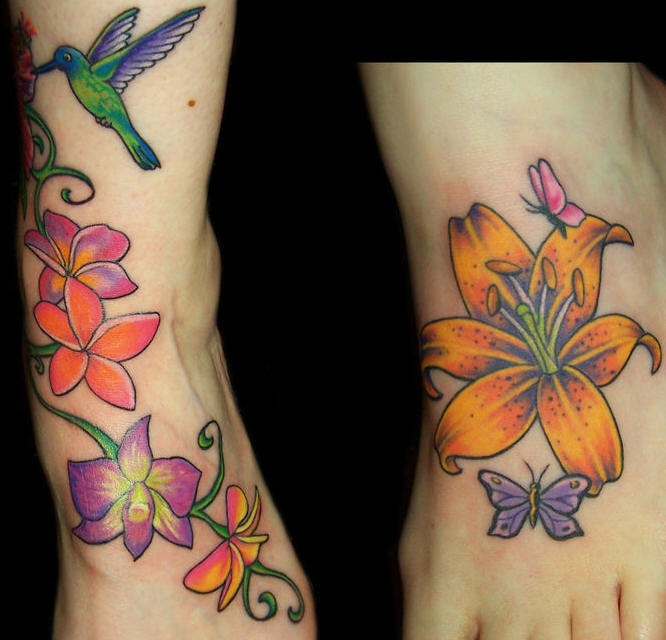Colourful lilies with hummingbird foot tattoo