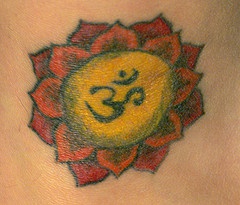 Orange and yellow hindu lotus tattoo