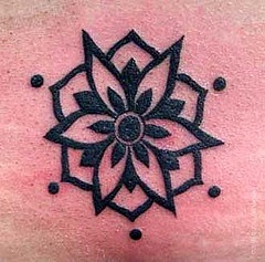Black flower lined tattoo