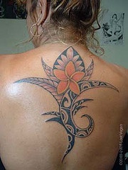 Large tribal style flower on back