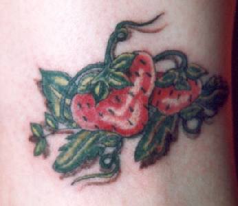 Red flower in black dot tattoo