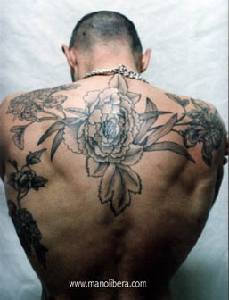 Black flowers full back tattoo