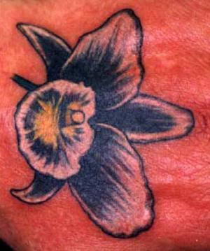 Black flower blossom tattoo