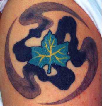 Blue leaf on water paint tattoo