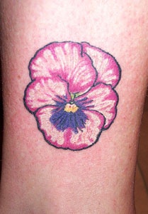 Cute pink flower tattoo