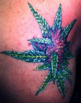 Exotic green flower tattoo